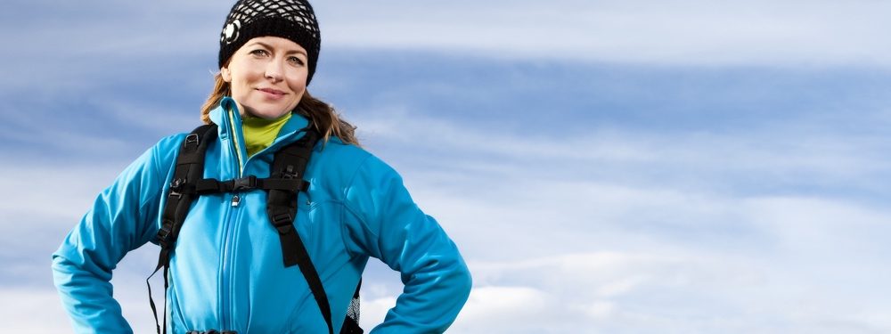 Lady hiking with hand on hips