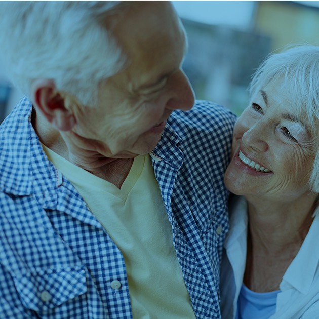 Couple embracing and smiling at each other Golden Leaves