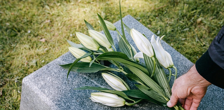 Laying Flowers on a Grave