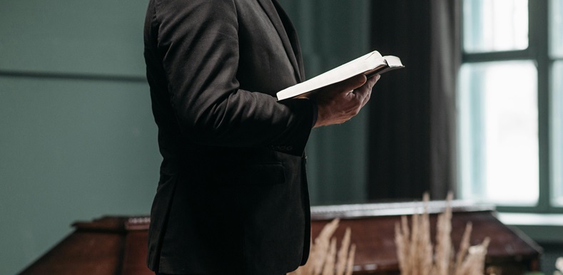 Officiant at a Funeral