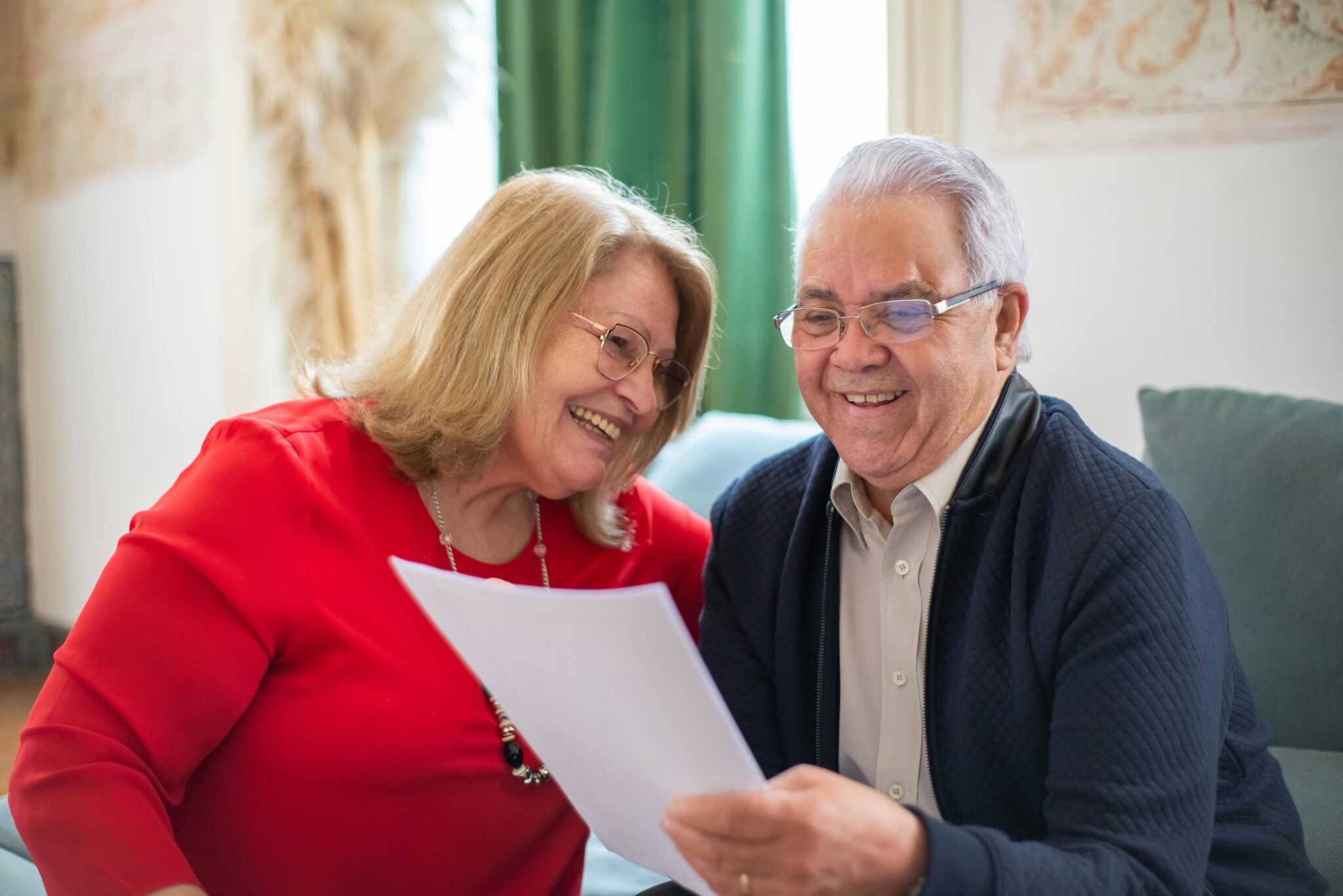 Elderly Couple Looking at a Document