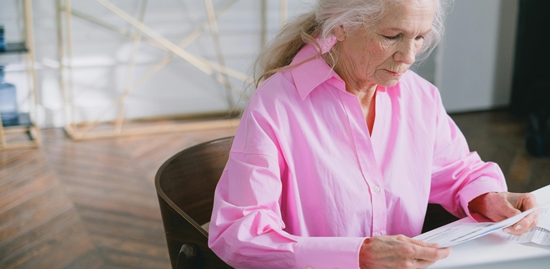 Elderly women looking at a document