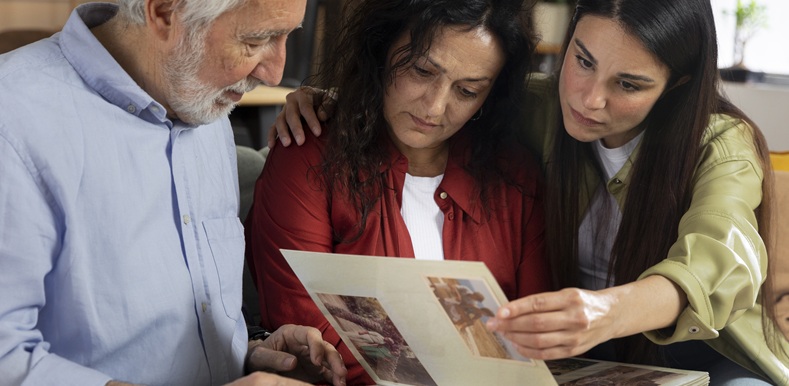 people-looking-picture-albums