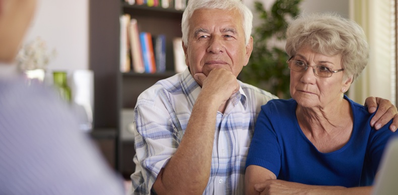 Senior couple paying a visit at accountant